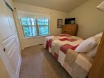 Master bedroom with queen-size bed.